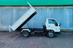 Самосвал ISUZU 4x2 дв 96kw 3200х2000х400 под категорию B. Фото 2