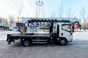 Автокран на шасси ISUZU 4x2 	дв 96kw крановая установка  WANBANG DZ5T гп 5т стрела 20м с ямобуром диаметром 400мм глубина бурения 12м, корзина. Фото 2