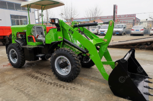 Фронтальный погрузчик YUGONG ZL07 , гп 600кг,  без кабины (только навес). Фото 2