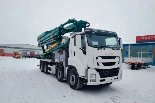 Автобетоносмеситель на шасси ISUZU 8x4 дв 309 Kw, бочка 9м3 с распределительной стрелой 33м и насосом. Фото 1