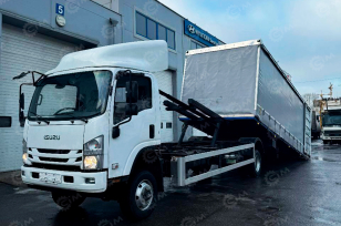 Эвакуатор на шасси ISUZU 4x2 дв 139kw платформа сдвижная крытая, лебедка гп 6т. Фото 1