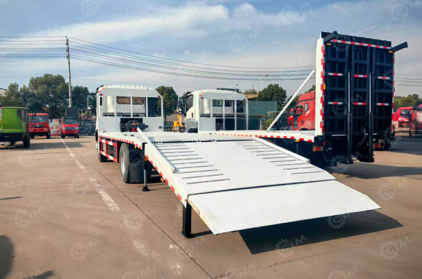 Эвакуатор на шасси ISUZU 6х2	дв 177kw не сдвижная платформа, гидравлическая откидная аппарель выдвижная, бриль и лебедка гп 10т. Фото 3