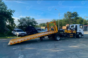 Эвакуатор на шасси ISUZU 4x2 дв 96Kw гп 4т КМУ XCMG SQZ32 гп 2т сдвижная платформа, лебедка. Фото 3