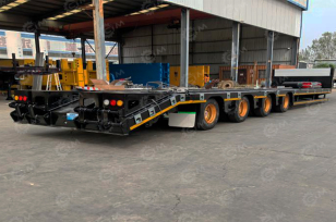 Полуприцеп трал LUXUDA 4 оси, 60т, 16500х2500х3650 складывающимися трапами вровень с полом, первая ось ленивая, коники, фитинги, ССУ 1350. Фото 1