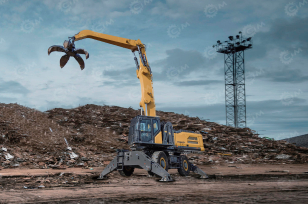 Перегружатель колесный XCMG XE240WGMA с подъёмной кабиной, грейферный ковш 1,5м3. Фото 1