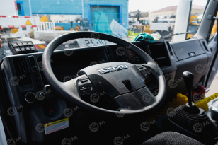 Мусоровоз на шасси ISUZU 4x2 дв 151Kw гп 9 т, объем 10м3. Фото 6