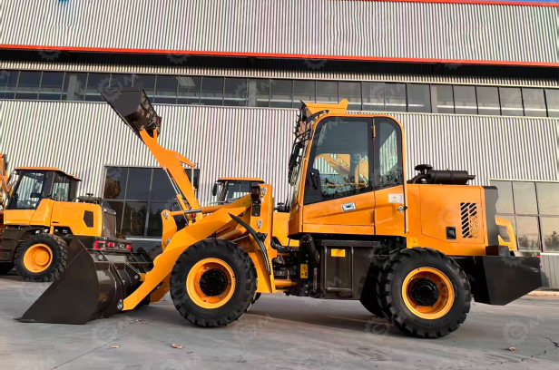 Фронтальный погрузчик YUGONG ZL16, г/п 1т,  масса 2,4т, дв  36Kw, ковш 0,6м3. Фото 3