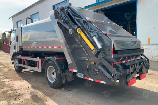 Мусоровоз на шасси ISUZU 4x4 151Kw гп 8 т объем 10м3. Фото 1