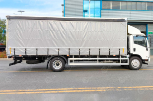 Фургон шторный на шасси ISUZU 4x2 дв 151kw кабина Elf фургон 6500х2500х2600 со спальником. Фото 1