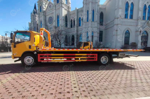 Эвакуатор на шасси ISUZU 4x2 дв 139kw Elf P700 сдвижная платформа 6,5м, лебедка. Фото 2