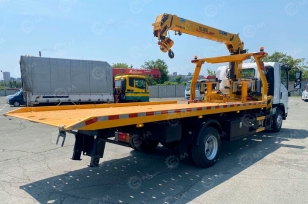 Эвакуатор на шасси ISUZU 4x2 дв 88Kw гп 3 т КМУ WANGBANG SQS100-3 гп 4т сдвижная платформа. Фото 2