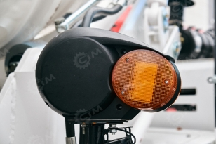 Самозагружающий самоходный бетоносмеситель YUGONG SDM1200 ковш с гидрозапором. Фото 7