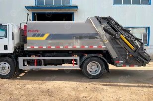 Мусоровоз на шасси ISUZU 4x2 дв 139Kw гп 5т объем 10м3 8 колесных шпилек. Фото 1