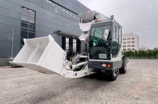 Самозагружающий автобетоносмеситель YUGONG SDM6500 поворотная бочка, весы. Фото 1