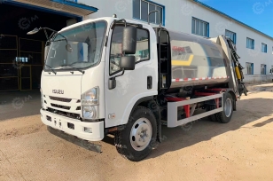 Мусоровоз на шасси ISUZU 4x2 дв 138Kw объем 12м3, задняя загрузка, 8 колесных шпилек. Фото 1