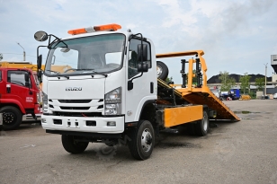 Эвакуатор на шасси ISUZU 4x4	дв 139kw гп 5т сдвижная  платформа 5,6м подъёмный механизм. Фото 3