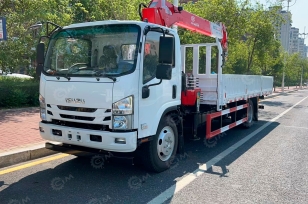 Бортовой грузовик ISUZU 4x2 дв 138kw с кму WANBANG SQS157-5 гп 6,3т, 5 секций, вылет стрелы 16,9м кузов 6000*2450*600, ПДУ, корзина, подогрев двигателя  Webasto. Фото 1