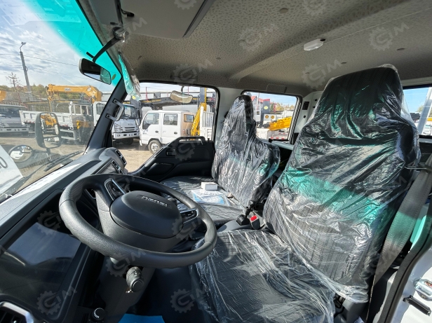 Бортовой грузовик ISUZU 4x4 дв 96Kw двойная кабина гп 1т под категорию В, кузов 3245х1850х400, с тентом. Фото 2