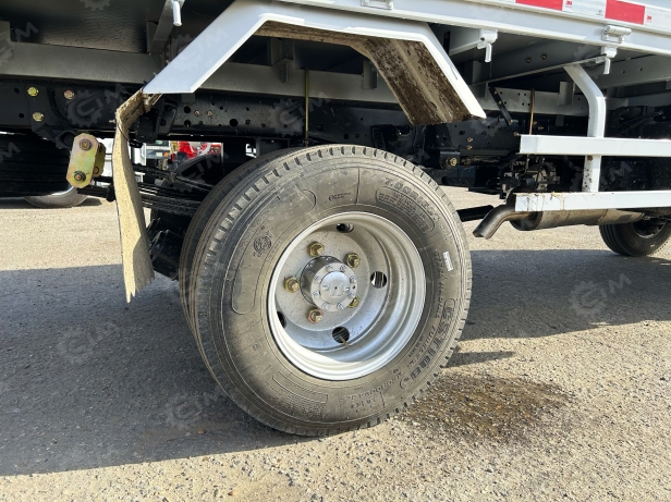 Бортовой грузовик ISUZU 4x4 дв 96Kw двойная кабина гп 1т под категорию В, кузов 3245х1850х400, с тентом. Фото 17