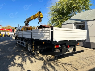 Бортовой грузовик ISUZU 4x2 дв 139kw гп 6 тонн с КМУ XCMG SQS125-4 гп 5 т., 4 секции, стрела 11,2 м, со спальником, задние аутригеры, корзина, ПДУ, колеса с 8 шпильками. Фото 8