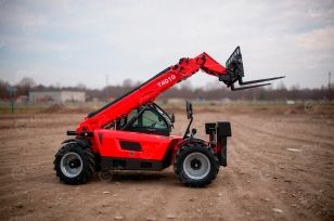 Телескопический погрузчик Yugong TR4010 4WD, крабовый ход, гп 4т, высота 10м,  дв YUCHAI 72KW, кондиционер, вилы, ковш 1,8м3, щетка подметальная, кран-балка, сухой мост. Фото 1