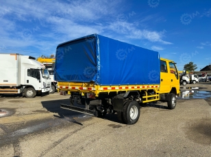 Бортовой грузовик ISUZU 4x4 дв 96Kw гп 2т двойная кабина кузов 3245х1850х400 с тентом под категорию B (новый интерьер кабины, серебряная металлическая краска). Фото 13