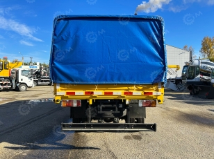 Бортовой грузовик ISUZU 4x4 дв 96Kw гп 2т двойная кабина кузов 3245х1850х400 с тентом под категорию B (новый интерьер кабины, серебряная металлическая краска). Фото 14