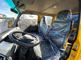 Бортовой грузовик ISUZU 4x4 дв 96Kw гп 2т двойная кабина кузов 3245х1850х400 с тентом под категорию B (новый интерьер кабины, серебряная металлическая краска). Фото 18